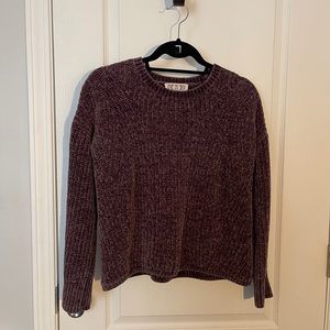 A small pink Rose sweater